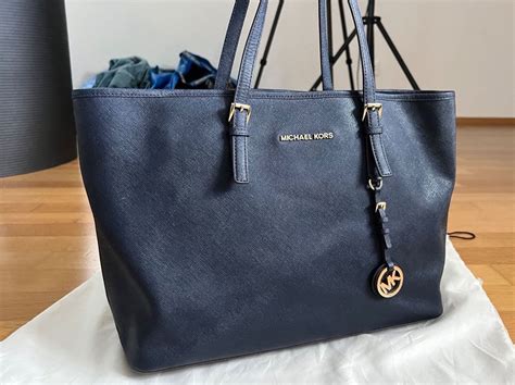 michael kors staubbeutel|Michael Kors leather tote.